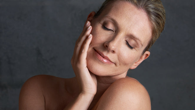 Woman touching her skin