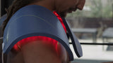 A man using Celluma device for pain treatment