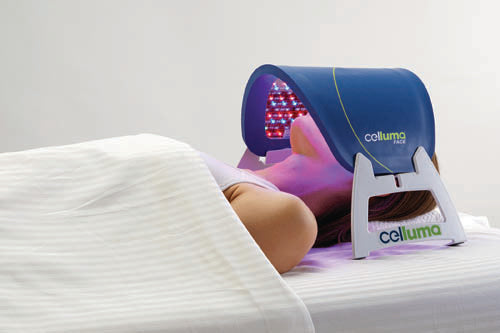 Woman using Led Light Therapy for her face