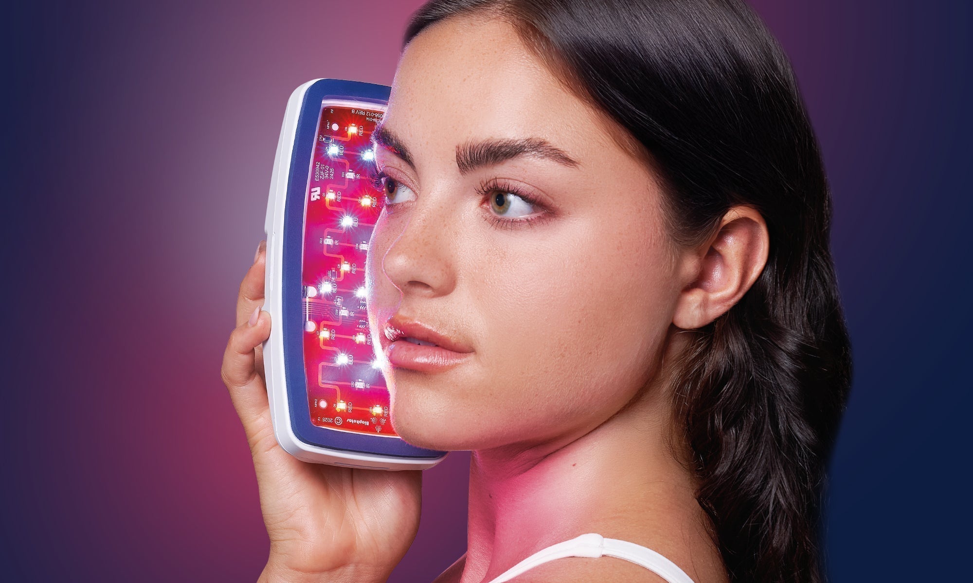 Woman using the all new Celluma POD device