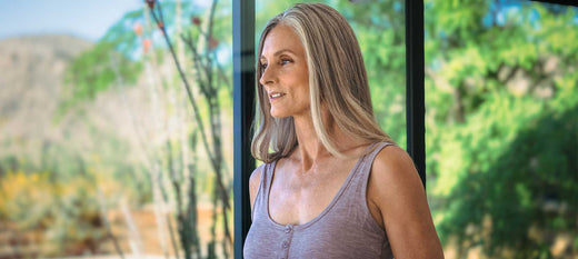 Image of a middle-aged woman with few eye wrinkles and fine lines after using red light therapy