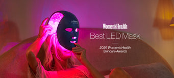 Woman with a MYSTIQUE mask on her face with the women's health logo and BEST LED Mask next to the woman.