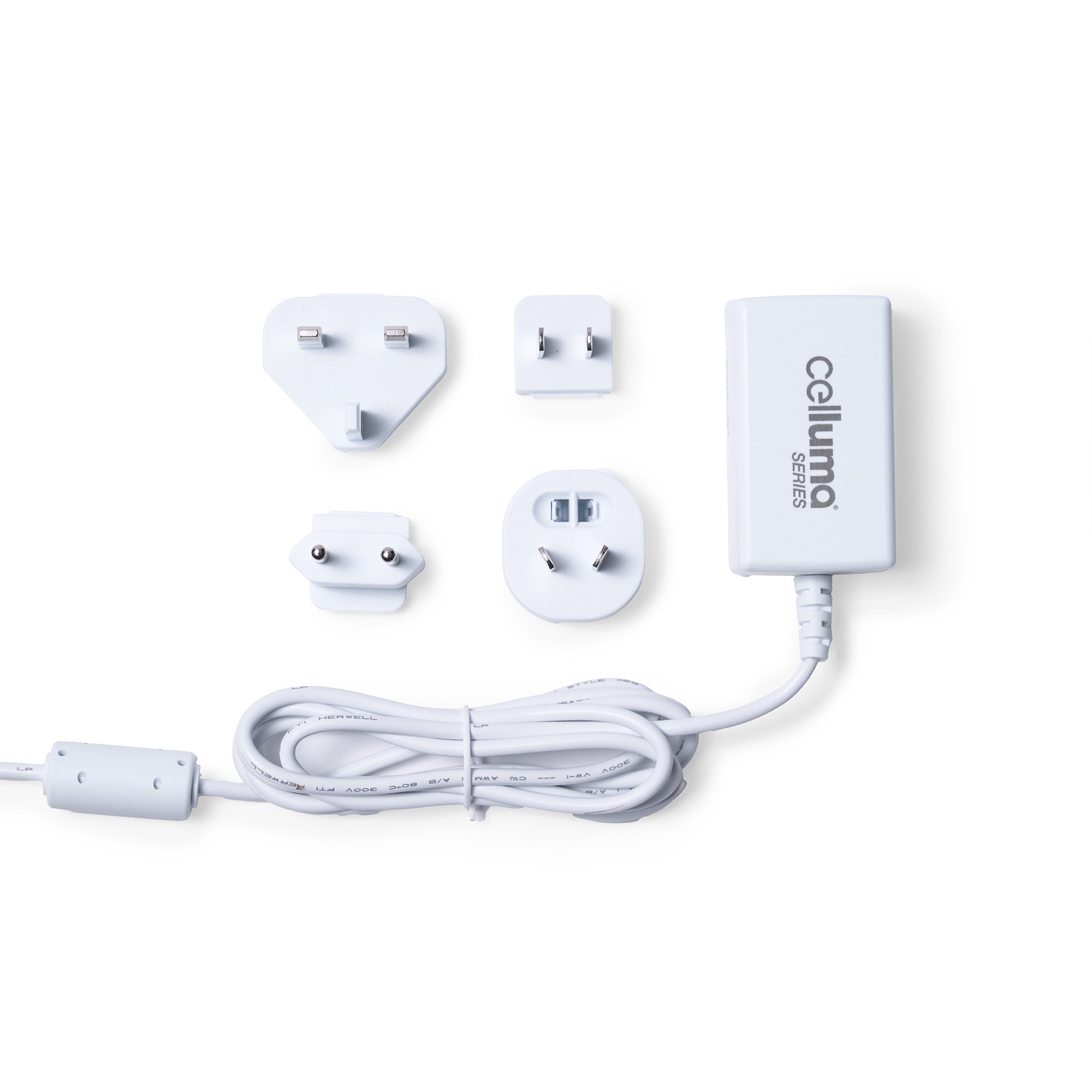 Celluma Series 2 power adapter with interchangeable international plug attachments and charging cable for LED light therapy devices.